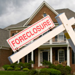 Foreclosure sign in frontyard of home