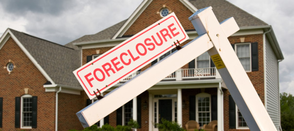 Foreclosure sign in frontyard of home